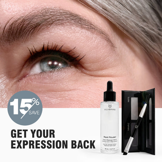 Woman with naturally silver hair wearing True Expression brow powder beside the Big Expression brow growth serum and powder set. 
