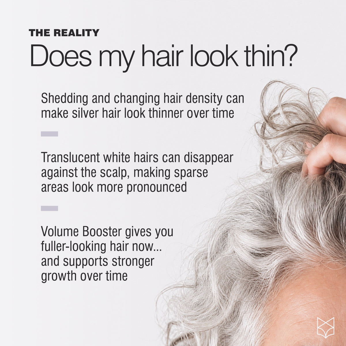 Close view of naturally white silver hair showing visible scalp along a thinning hair line.